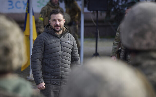 Ukrainian President Volodymyr Zelensky talks to soldiers during a visit to Kherson, Ukraine, November 14, 2022. (Ukrainian Presidential Press Office via AP) Ukrainian President Volodymyr Zelensky talks to soldiers during a visit to Kherson, Ukraine, November 14, 2022. (Ukrainian Presidential Press Office via AP)