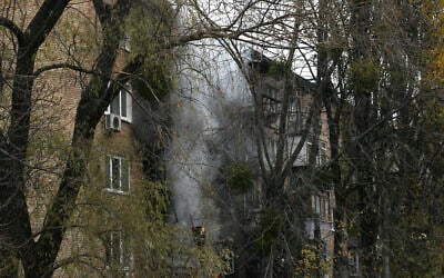 A damaged building seen at the scene of Russian shelling in Kyiv, Ukraine, November 15, 2022. (AP Photo/Andrew Kravchenko)