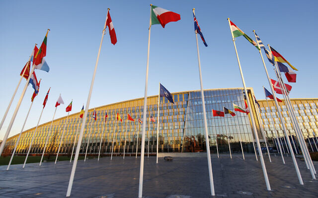 Flags of NATO members fly outside the NATO headquarters, November 16, 2022 in Brussels. (AP Photo/Olivier Matthys) Flags of NATO members fly outside the NATO headquarters, November 16, 2022 in Brussels. (AP Photo/Olivier Matthys)