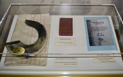 Artifacts are displayed on November 13, 2022, at the New Light Memorial Chapel in Shaler, Pennsylvania, including religious items used by the three members of New Light Congregation who were among the 11 victims of the October 27, 2018, massacre at Pittsburgh’s Tree of Life synagogue building. (AP Photo/Peter Smith)