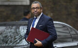 Britain's Foreign Secretary James Cleverly arrives in Downing Street in London, Thursday, Nov. 17, 2022. (AP Photo/Alastair Grant)