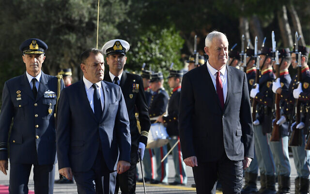 Defense Minister Benny Gantz, right, and his Greek counterpart Nikos Panagiotopoulos, inspect an honor guard before their meeting at the Greek Ministry of Defense, in Athens, Greece, Nov. 18, 2022. (AP Photo/Michael Varaklas) Defense Minister Benny Gantz, right, and his Greek counterpart Nikos Panagiotopoulos, inspect an honor guard before their meeting at the Greek Ministry of Defense, in Athens, Greece, Nov. 18, 2022. (AP Photo/Michael Varaklas)