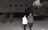 This photo provided on Nov. 19, 2022, by the North Korean government shows North Korean leader Kim Jong Un, right, and his daughter inspecting a missile at Pyongyang International Airport in Pyongyang, North Korea, Friday, Nov. 18, 2022.(Korean Central News Agency/Korea News Service via AP)