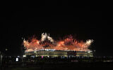 Fireworks explode over the Al Bayt Stadium before the start of the World Cup, group A soccer match between Qatar and Ecuador in Al Khor, Qatar, November 20, 2022. (AP/Alessandra Tarantino)