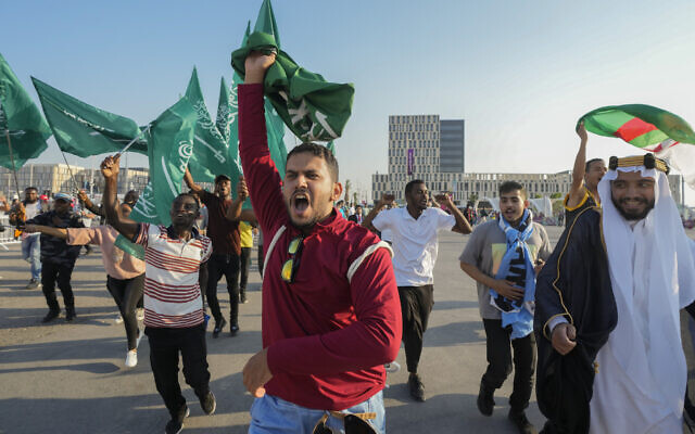 Fans of Saudi Arabia celebrate their team's 2-1 victory over Argentina in a World Cup group C soccer match, outside the Lusail Stadium in Lusail Qatar, November 22, 2022. (AP Photo/Andre Penner) Fans of Saudi Arabia celebrate their team's 2-1 victory over Argentina in a World Cup group C soccer match, outside the Lusail Stadium in Lusail Qatar, November 22, 2022. (AP Photo/Andre Penner)