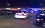 In this image from video Virginia police respond to the scene of a fatal shooting at a Walmart in Chesapeake, Virginia, November 22, 2022. (WAVY-TV 10 via AP)