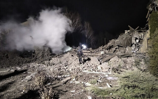 In this photo provided by the Zaporizhzhia region military administration, Ukrainian firefighters work at damaged hospital maternity ward in Vilniansk, Zaporizhzhia region, Ukraine,, Nov. 23, 2022. (Zaporizhzhia region military administration via AP)