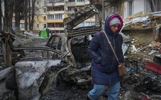 A woman walks by a house damaged during Russian shelling in the town of Vyshgorod outside the capital Kyiv, Ukraine, November 24, 2022. (AP Photo/Efrem Lukatsky) A woman walks by a house damaged during Russian shelling in the town of Vyshgorod outside the capital Kyiv, Ukraine, November 24, 2022. (AP Photo/Efrem Lukatsky)