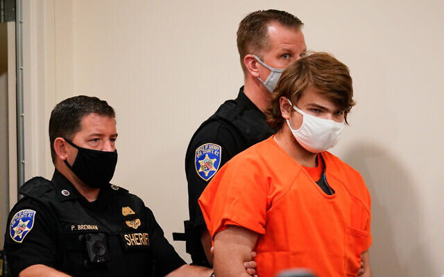 Payton Gendron is led into the courtroom for a hearing at Erie County Court in Buffalo, N.Y., on May 19, 2022.  (AP Photo/Matt Rourke, File)