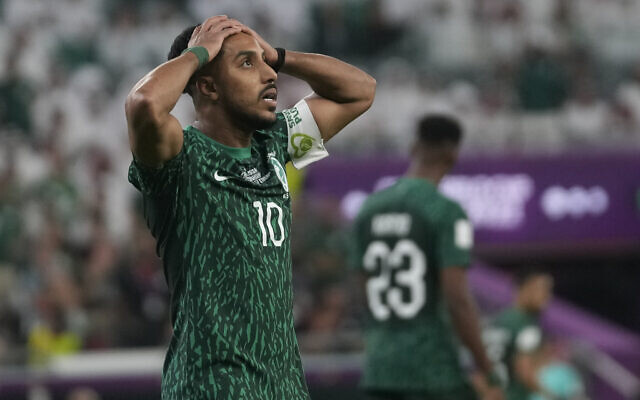 Saudi Arabia's Salem Al-Dawsari holds his head after missing a chance to score during the World Cup group C soccer match between Poland and Saudi Arabia, at the Education City Stadium in Al Rayyan , Qatar, Nov. 26, 2022. (AP Photo/Darko Vojinovic) Saudi Arabia's Salem Al-Dawsari holds his head after missing a chance to score during the World Cup group C soccer match between Poland and Saudi Arabia, at the Education City Stadium in Al Rayyan , Qatar, Nov. 26, 2022. (AP Photo/Darko Vojinovic)