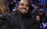 Kanye West watches the first half of an NBA basketball game between the Washington Wizards and the Los Angeles Lakers in Los Angeles, on March 11, 2022. (AP/Ashley Landis)