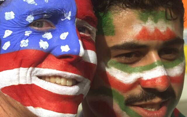 Mike Moscrop, left, from Orange County, Calif., poses with Amir Sieidoust, an Iranian supporter living in Holland outside the Gerlain Stadium in Lyon, June 21, 1998, before the start of the USA vs Iran World Cup soccer match. (AP Photo/Jerome Delay) Mike Moscrop, left, from Orange County, Calif., poses with Amir Sieidoust, an Iranian supporter living in Holland outside the Gerlain Stadium in Lyon, June 21, 1998, before the start of the USA vs Iran World Cup soccer match. (AP Photo/Jerome Delay)