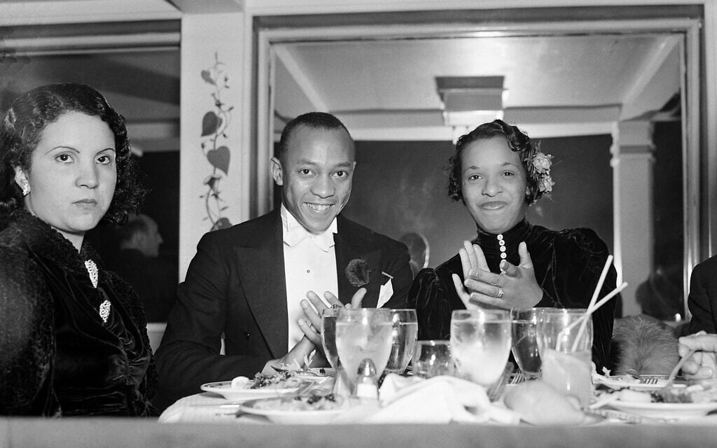 US Olympic medalist Jesse Owens and his wife Ruth Owens at the opening of The Cotton Club in New York, September 25, 1936. (AP Photo)