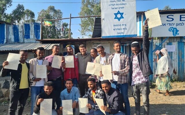 The 12 graduates of a program to train kosher slaughterers in Ethiopia so the Jewish community can have regular access to kosher meat, along with a rabbi from Israel who works with the community (center), in November 2022. (Ohr Torah Stone) The 12 graduates of a program to train kosher slaughterers in Ethiopia so the Jewish community can have regular access to kosher meat, along with a rabbi from Israel who works with the community (center), in November 2022. (Ohr Torah Stone)