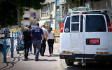 Illustrative: Police at a crime scene in the southern Israeli town of Kiryat Malachi. June 23, 2016. (Flash90)
