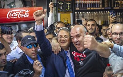 Otzma Yehudit chief MK Itamar Ben Gvir makes a campaign stop at Jerusalem's Mahane Yehuda market, October 28, 2022. (Olivier Fitoussi/Flash90)