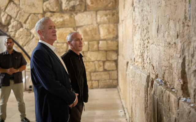 Defense Minister Benny Gantz (left) and Culture Minister Chili Tropper visit the Western Wall in Jerusalem's Old City, October 31, 2022. (Yonatan Sindel/Flash90) Defense Minister Benny Gantz (left) and Culture Minister Chili Tropper visit the Western Wall in Jerusalem's Old City, October 31, 2022. (Yonatan Sindel/Flash90)