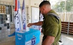 IDF soldier votes at the Sa'ar military base in central Golan Heights on November 1, 2022 (Michael Giladi/Flash90)