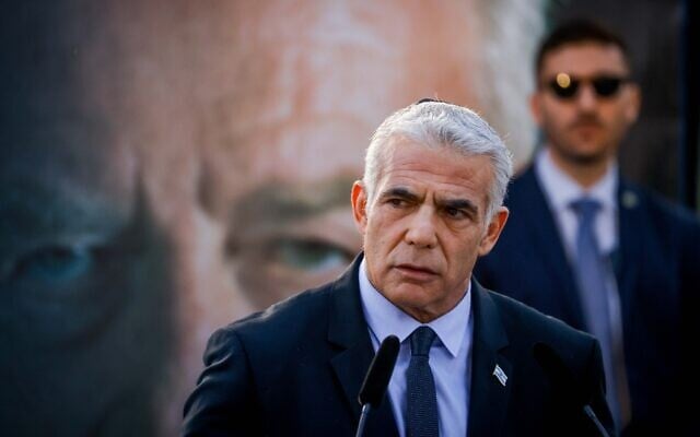 Prime Minister Yair Lapid at a memorial service marking 27 years since the assassination of late prime minister Yitzhak Rabin, held at Mount Herzl cemetery in Jerusalem, November 6, 2022. (Olivier Fitoussi/Flash90) Prime Minister Yair Lapid at a memorial service marking 27 years since the assassination of late prime minister Yitzhak Rabin, held at Mount Herzl cemetery in Jerusalem, November 6, 2022. (Olivier Fitoussi/Flash90)