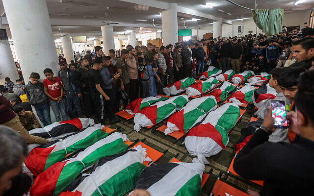 The funeral of Palestinians who were killed in a fire that broke out in a building in the Jabalia refugee camp, in the northern Gaza Strip, November 18, 2022. (Attia Muhammed/Flash90) The funeral of Palestinians who were killed in a fire that broke out in a building in the Jabalia refugee camp, in the northern Gaza Strip, November 18, 2022. (Attia Muhammed/Flash90)