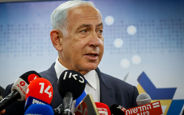 Likud party chairman MK Benjamin Netanyahu speaks to the media at the Shaare Tzedek hospital in Jerusalem on November 23, 2022. (Olivier Fitoussi/Flash90) Likud party chairman MK Benjamin Netanyahu speaks to the media at the Shaare Tzedek hospital in Jerusalem on November 23, 2022. (Olivier Fitoussi/Flash90)