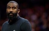 Amar'e Stoudemire, then a Brooklyn Nets assistant coach, looks on during a game in Phoenix, Arizona, Feb. 1, 2022. (Christian Petersen/Getty Images via JTA)
