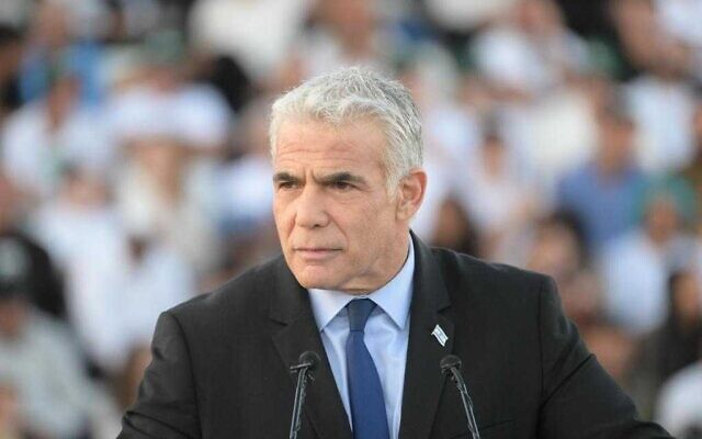 Outgoing Prime Minister Yair Lapid addresses IDF cadets graduating from the military's officer's course at Bahad 1 in southern Israel, November 10, 2022. (Amos Ben Gershom/GPO) Outgoing Prime Minister Yair Lapid addresses IDF cadets graduating from the military's officer's course at Bahad 1 in southern Israel, November 10, 2022. (Amos Ben Gershom/GPO)
