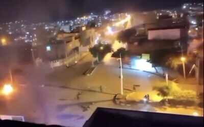 Screen capture from video purporting to show the moments when shots were fired at a market in the city of Izeh, Iran, November 16, 2022. (Twitter. Used in accordance with Clause 27a of the Copyright Law)