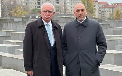 Palestinian Authority Foreign Minister Riad al-Maliki (L) and Palestinian Ambassador to Germany Laith Arafeh visit the Holocaust memorial in Berlin on November 17, 2022. (Laith Arafeh/ Twitter)