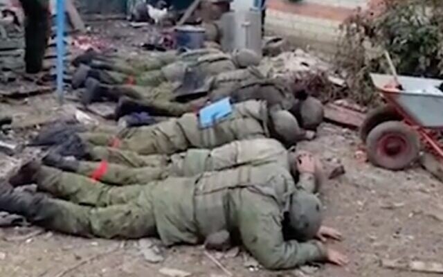 Russian troops surrendering in Ukraine in a clip widely shared on social media in November 2022. (Screen capture/Twitter) Russian troops surrendering in Ukraine in a clip widely shared on social media in November 2022. (Screen capture/Twitter)