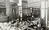 German Nazis stand by ransacked Jewish property during Kristallnacht, most likely in the town of Fuerth, Germany, on Nov. 10, 1938. (Yad Vashem via AP)