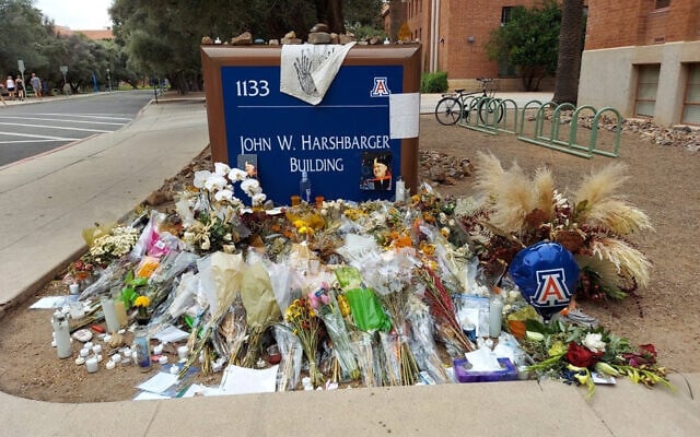 A memorial for University of Arizona professor Thomas Meixner outside the school's Department of Hydrology and Atmospheric Sciences building in Tucson, Arizona, October 14, 2022. (AP Photo/Terry Tang) A memorial for University of Arizona professor Thomas Meixner outside the school's Department of Hydrology and Atmospheric Sciences building in Tucson, Arizona, October 14, 2022. (AP Photo/Terry Tang)
