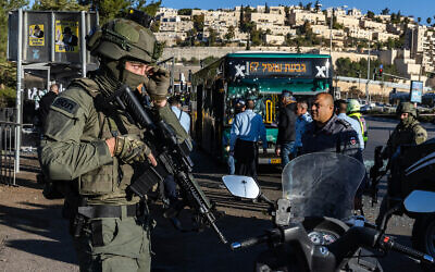 Police and security personnel at the scene of a terror attack in Jerusalem, on November 23, 2022. (Olivier Fitoussil/Flash90)