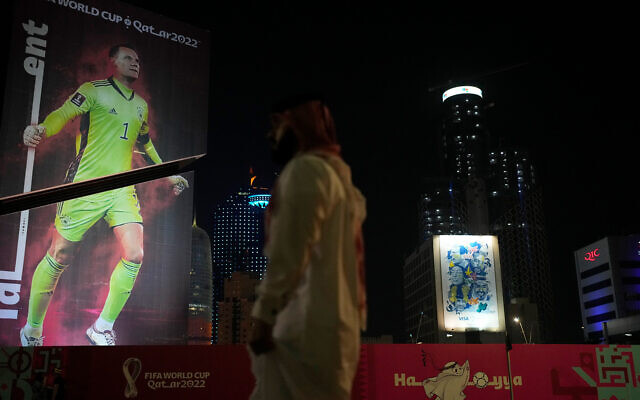A giant poster depicting Germany's goalkeeper Manuel Neuer covers a skyscraper ahead of the World Cup in Doha, Qatar, November 18, 2022. (AP Photo/Thanassis Stavrakis) A giant poster depicting Germany's goalkeeper Manuel Neuer covers a skyscraper ahead of the World Cup in Doha, Qatar, November 18, 2022. (AP Photo/Thanassis Stavrakis)