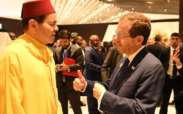 President Isaac Herzog speaks with Moroccan Prince Moulay Rachid at the UN COP27 climate conference in Sharm el-Sheikh, November 7, 2022. (Haim Zach/GPO) President Isaac Herzog speaks with Moroccan Prince Moulay Rachid at the UN COP27 climate conference in Sharm el-Sheikh, November 7, 2022. (Haim Zach/GPO)