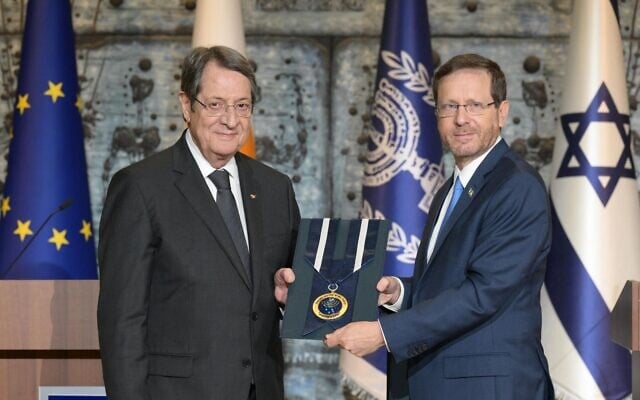 President Isaac Herzog awards the Israeli Presidential Medal of Honor to the President of the Republic of Cyprus, Nicos Anastasiades, November 9, 2022 (Amos Ben Gershom/GPO) President Isaac Herzog awards the Israeli Presidential Medal of Honor to the President of the Republic of Cyprus, Nicos Anastasiades, November 9, 2022 (Amos Ben Gershom/GPO)