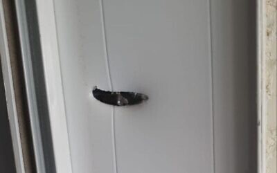 Damage caused to a home in the settlement of Shaked following a shooting attack, November 16, 2022. (Samaria Regional Council)