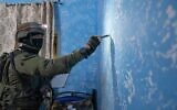 Israeli troops measure the home of Muhammed Souf, who killed three in a terror attack near Ariel, in the West Bank village of Hares, on November 16, 2022. (Israel Defense Forces)