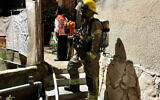 Fire and rescue services at the scene of an apartment blaze in Haifa on November 9, 2022. (Fire and rescue services)