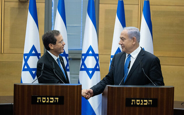 Illustrative: Isaac Herzog after being chosen as president with then prime minister Benjamin Netanyahu at the Knesset in Jerusalem, June 2, 2021. (Yonatan Sindel/Flash90)
