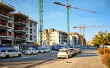 Illustrative. Apartment buildings under construction in Beersheba's Ramot neighborhood, August 2018. (verbaska_studio via iStock by Getty Images)