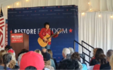 Jaymie Bellet, a Messianic Jew, serenades GOP gubernatorial candidate Doug Mastriano, in Bucks County, Pennsylvania, Nov. 7, 2022. (Twitter via JTA)