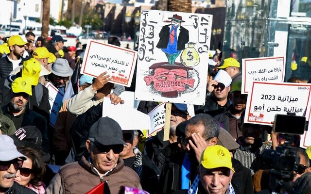 Demonstrators take part in a march in Rabat, Morocco, to protest 'soaring prices, political repression and social oppression,' on December 4, 2022. (AFP) Demonstrators take part in a march in Rabat, Morocco, to protest 'soaring prices, political repression and social oppression,' on December 4, 2022. (AFP)