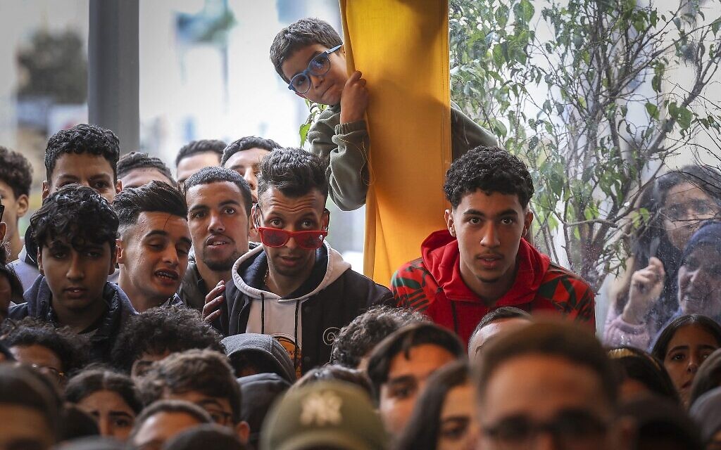 Morocco's supporters react as they watch the Qatar 2022 World Cup soccer match between Morocco and Portugal, at a coffee shop in Rabat, on December 10, 2022. (FADEL SENNA / AFP)