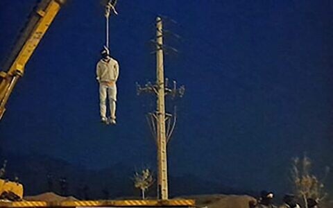 Illustrative: A picture obtained from the Iranian Mizan News Agency on December 12, 2022, shows the public execution of Majidreza Rahnavard, in Iran's Mashhad city. (Mizan News/AFP)