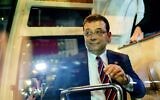 Istanbul Mayor Ekrem Imamoglu joins his supporters as they gather in front of Istanbul Metropolitan Municipality during a protest in Istanbul, after a Turkish court sentenced him to nearly three years jail in a politically charged trial, on December 14, 2022. (Yasin AKGUL/AFP)