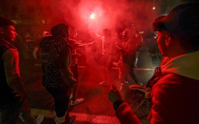 Moroccan soccer fans react after their country's loss to France at the World Cup semifinal match in Qatar, in Morocco's capital Rabat, on December 14, 2022. (Fadel Senna/AFP) Moroccan soccer fans react after their country's loss to France at the World Cup semifinal match in Qatar, in Morocco's capital Rabat, on December 14, 2022. (Fadel Senna/AFP)