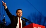 Istanbul Mayor Ekrem Imamoglu delivers a speech for his supporters during a protest in front of the Istanbul Metropolitan Municipality in Istanbul on December 15, 2022, after a Turkish court sentenced him to more than two years jail and banned him from politics ahead of next year's presidential election. (Yasin AKGUL / AFP)