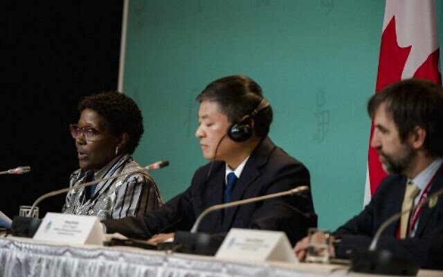 From left to right: Executive Secretary of the UN Convention on Biological Diversity, Elizabeth Maruma Mrema; Chinese Ecology and Environment Minister, Huang Runqiu; and Canadian Minister of the Environment and Climate Change, Steven Guilbeault, hold a joint press confrence at the UN Biodiversity Conference (COP15) in Montreal, Quebec, Canada on December 17, 2022. (ANDREJ IVANOV/AFP) From left to right: Executive Secretary of the UN Convention on Biological Diversity, Elizabeth Maruma Mrema; Chinese Ecology and Environment Minister, Huang Runqiu; and Canadian Minister of the Environment and Climate Change, Steven Guilbeault, hold a joint press confrence at the UN Biodiversity Conference (COP15) in Montreal, Quebec, Canada on December 17, 2022. (ANDREJ IVANOV/AFP)
