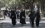 In this file photo taken on October 13, 2022, Afghan female students arrive for entrance exams at Kabul University in Kabul. (Wakil KOHSAR / AFP)